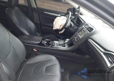 2016 Ford Fusion Titanium z USA, uszkodzony, nr VIN 3FA6P0D99GR162157